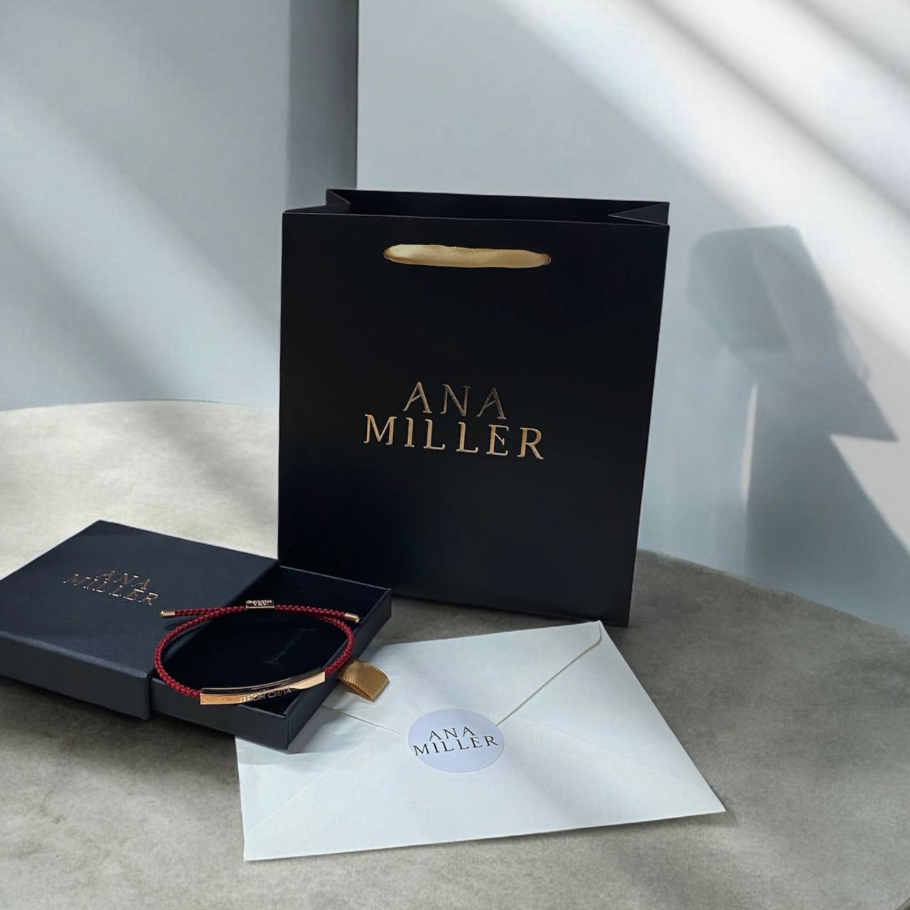 Ana Millerβ’ Red Bracelet "Your Power"